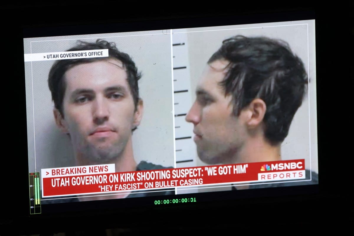 A TV monitor displays a picture of Tyler Robinson, the suspected of killing Charlie Kirk on September 11, in Orem, Utah, on September 12, 2025.