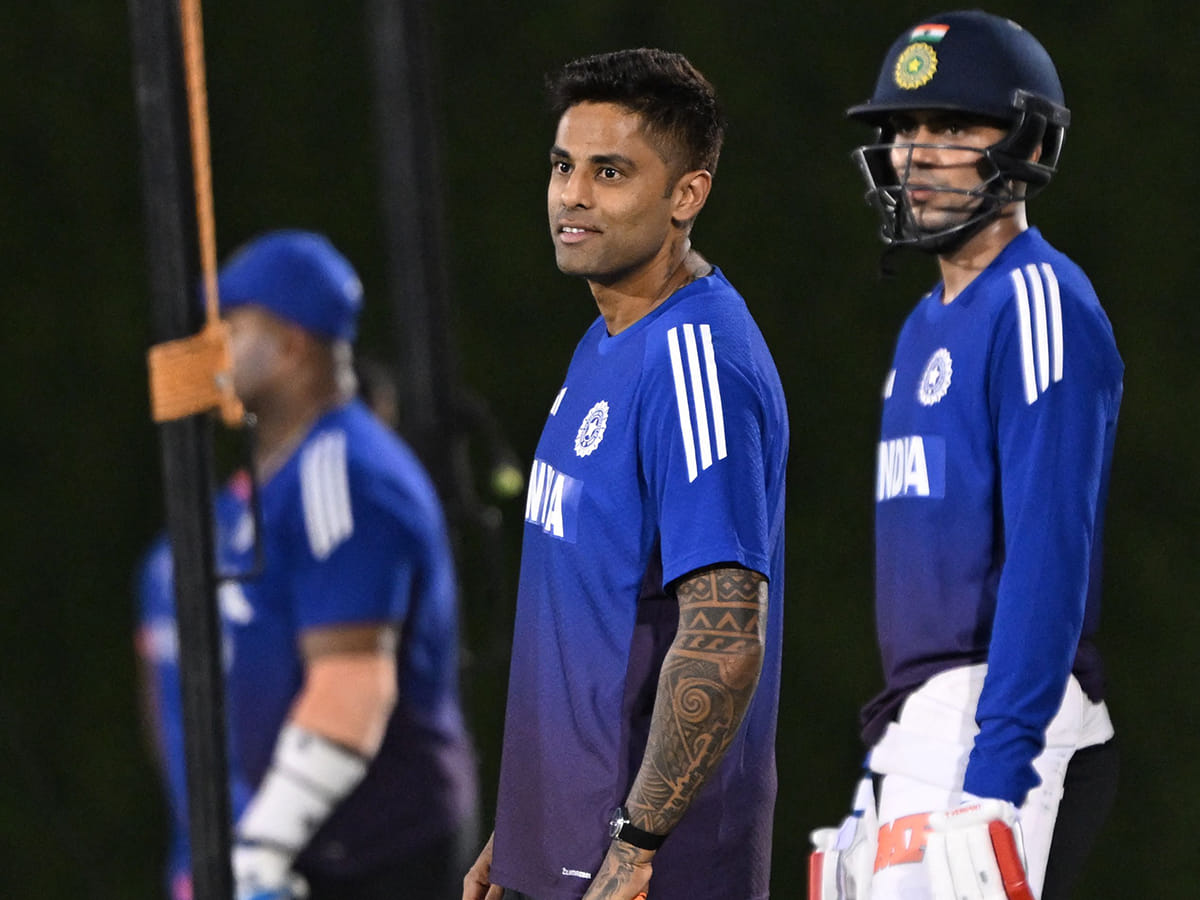 India's captain Suryakumar Yadav (C) and Shubman Gill (R) gesture during a practice session at ICC Academy in Dubai on September 13, 2025, on the eve of their Asia Cup 2025 T20 match against Pakistan. 