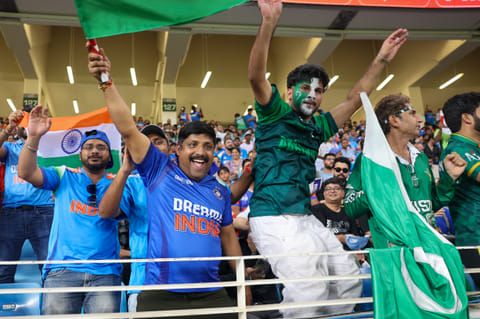 Indian and Pakistan fans togethether enjoying India vs Pakistan clash in the DP World Asia Cup match at Dubai International cricket stadium on Sunday.