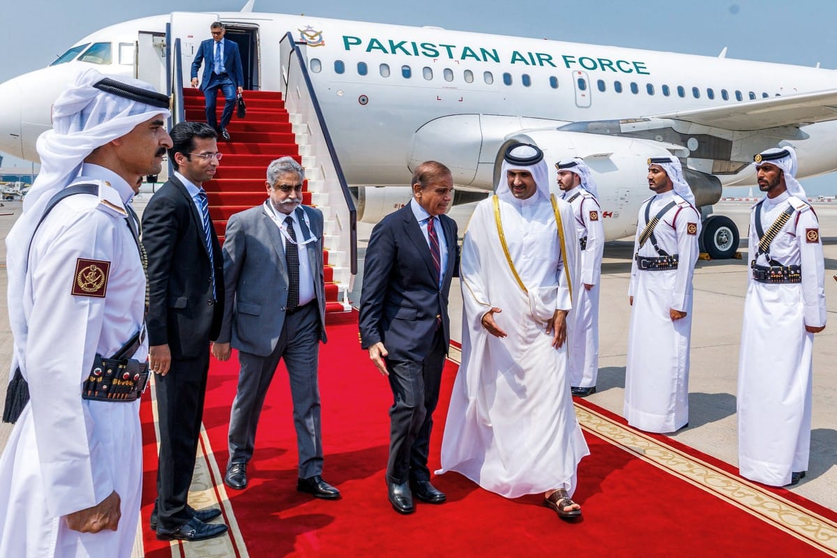 This handout picture released by the Qatar News Agency (QNA) shows Qatar's Deputy Prime Minister and Minister of State for Defence Affairs Sheikh Saud bin Abdulrahman al-Thani (C-R) receiving Pakistan's Prime Minister Shehbaz Sharif (C-L) in Doha on September 15, 2025.