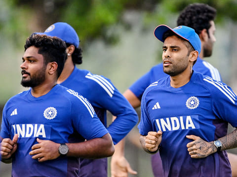 Sanju Samson (left) and Suryakumar Yadav (right) attend a practice session at the ICC Academy in Dubai on September 16, 2025, ahead of their Asia Cup 2025 T20 match against Oman. 