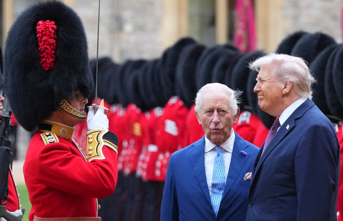US President Donald Trump and Britain's King Charles III inspect a Guard of Honour during a Ceremonial Welcome in the Quadrangle at Windsor Castle, in Windsor, on September 17, 2025, during the US President's second State Visit.