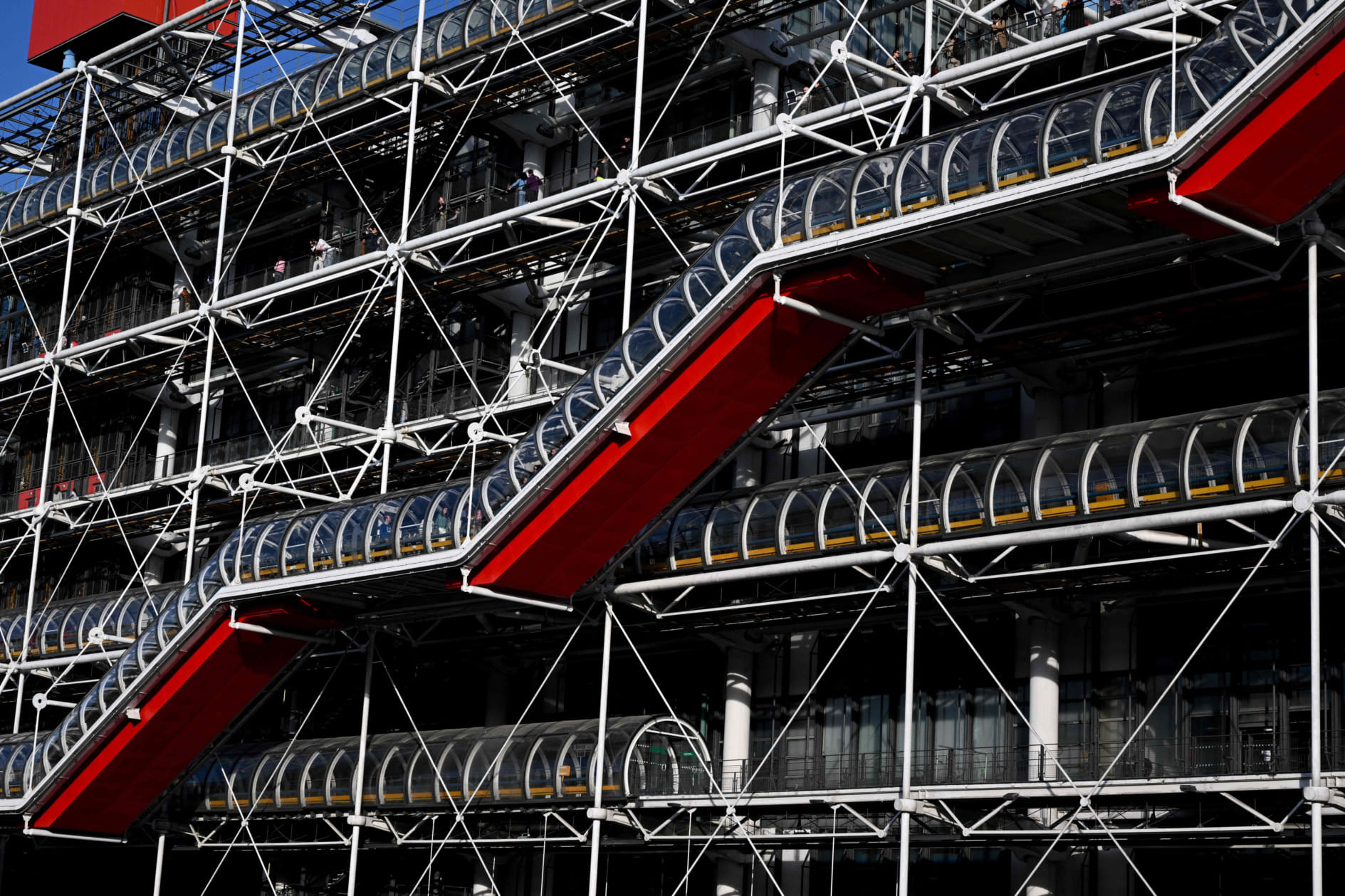 The museum, famed for its multicoloured exterior and exposed piping and escalators, draws millions of visitors every year to admire the architecture as much as the art.