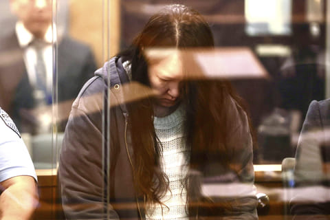 Hakyung Lee stands in the dock at the High Court in Auckland, New Zealand