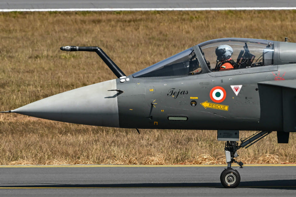 The Indian Air Force (IAF) HAL Tejas fighter jet prepares to take off during Aero India 2025, a military aviation exhibition at the Yelahanka Air Force Station in Bengaluru on February 13, 2025.  