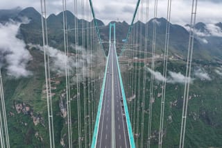 World’s highest bridge opens to traffic in China