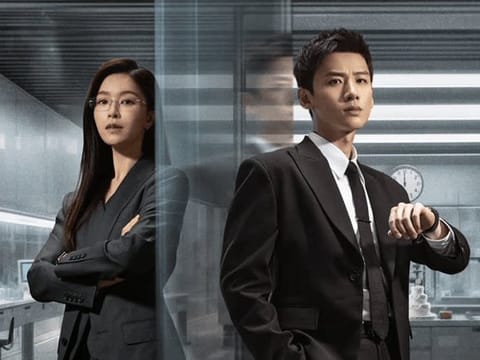 Mobius works best when it leans into the thriller aspect — suspicious CEOs, midnight resets, everyone being a potential traitor — and not when it tries to cue romantic elevator music.
