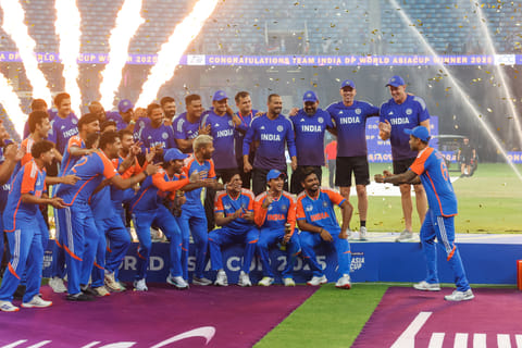 Indian captain Surya Kumar Yadav and team celebrate with an imaginary trophy after their win in the DP World Asia Cup final defeating Pakistan at Dubai International stadium on Sunday.