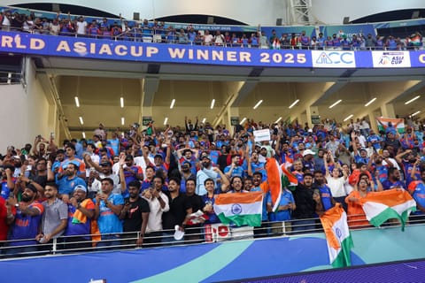 Indian fans celebrate their win in the DP World Asia Cup final defeating Pakistan at Dubai International stadium on Sunday.