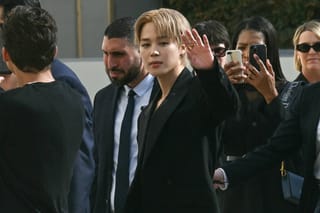 'It's BTS Jimin's world and we're just living in it': How he stole Paris Fashion Week with rings and cheeky grins 
