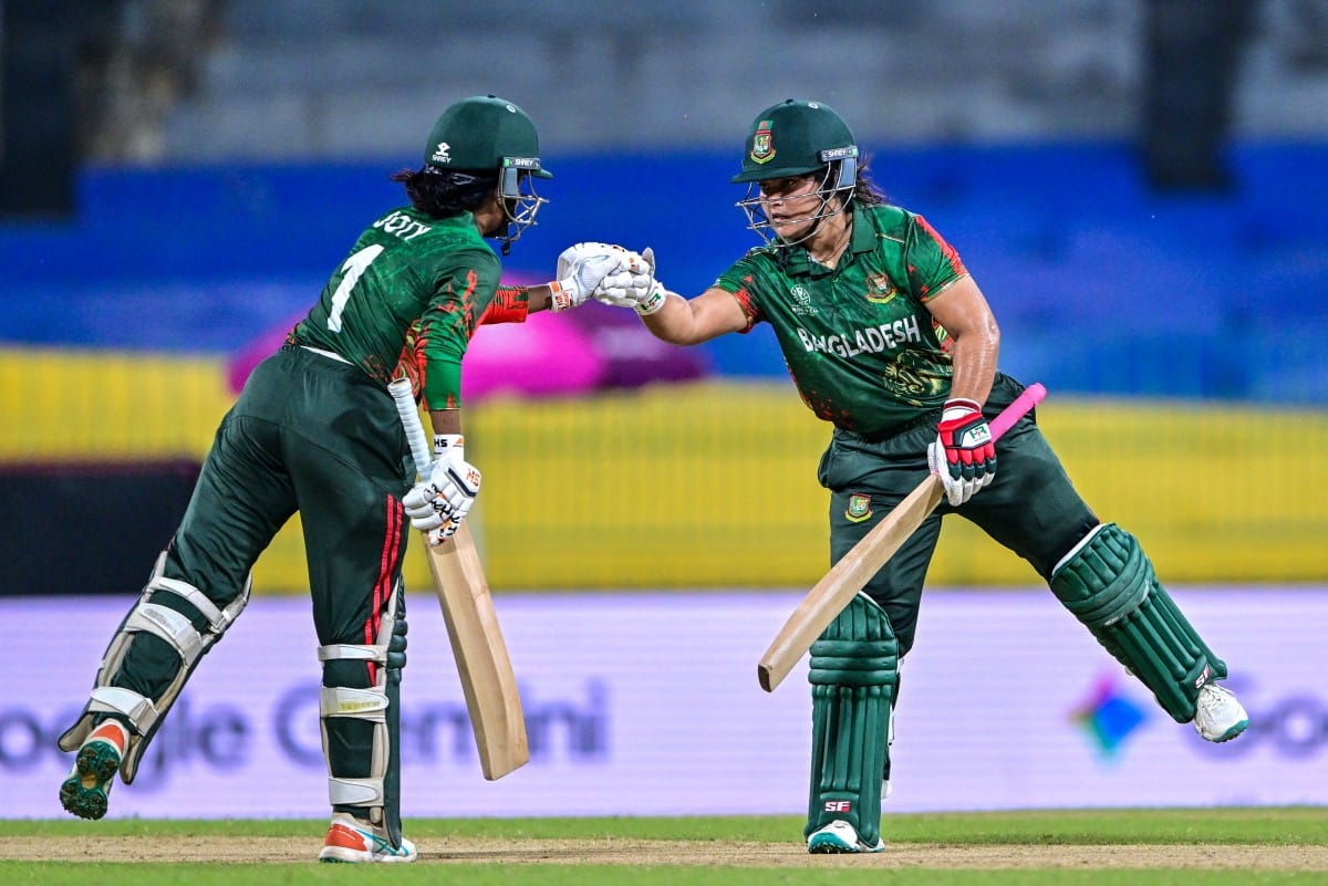 Bangladesh's Rubya Haider (R) and Nigar Sultana bump their fists during the ICC Women's Cricket World Cup 2025 One-Day International match at the R. Premadasa International Cricket Stadium in Colombo on October 2, 2025.