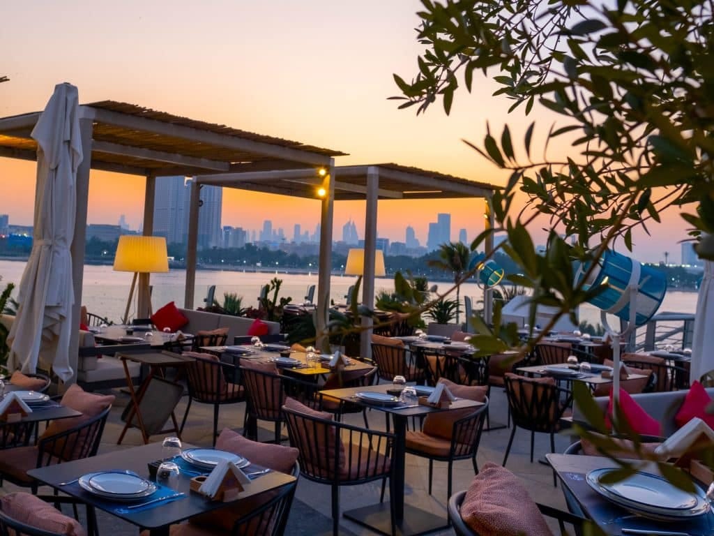 Perfect for lunch with fab daytime views, or  you can stick around for sunset magic that turns the sky golden at Ibn AlBahr at the Creek 