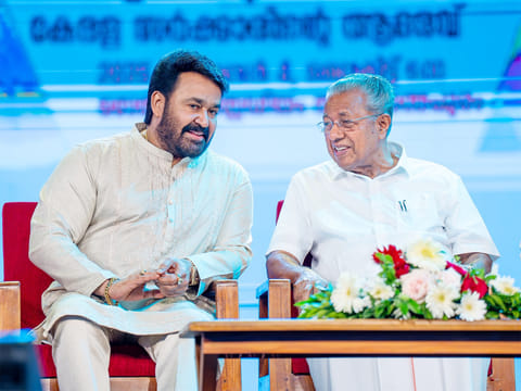 Mohanlal (left) with Kerala CM Pinarayi Vijayan on stage during the the state government’s public felicitation for the actor at the Central Stadium in Thiruvananthapuram on Saturday.