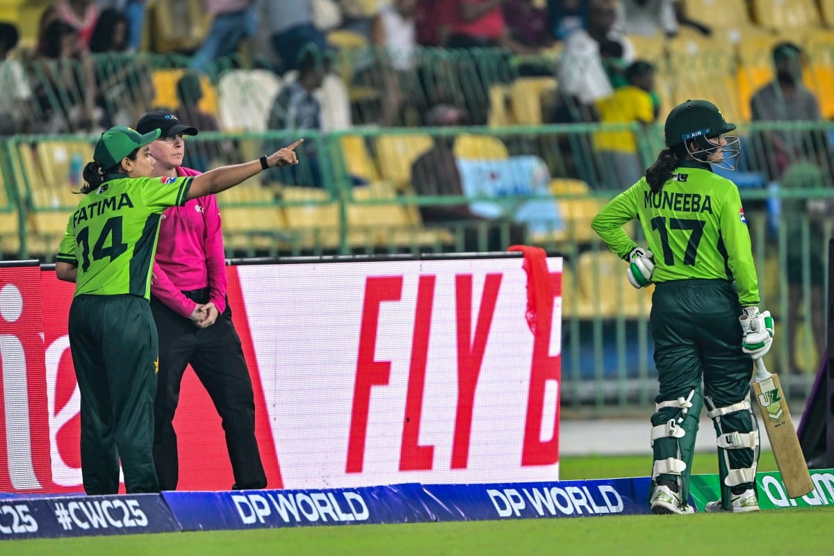 Pakistan's captain Fatima Sana (left) speaks with umpire after the dismissal of Pakistan's Muneeba Ali (R) during the ICC Women's Cricket World Cup 2025 one-day international (ODI) match against India at the R. Premadasa International Cricket Stadium in Colombo on October 5, 2025.