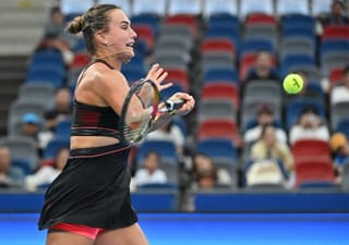 Sabalenka battles to keep Wuhan record alive, Pegula survives marathon