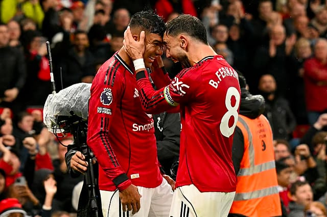 Manchester United's Brazilian midfielder Casemiro celebrates scoring the team's second goal during the English Premier League football match against Chelsea at Old Trafford in Manchester, north west England, on September 20, 2025.