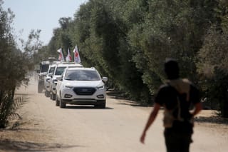 Hamas says to hand over bodies of two more hostages