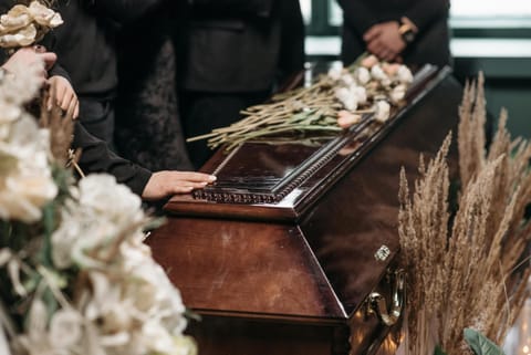 In June 2022, at the funeral of  father-in-law, she noticed an unfamiliar woman among the mourners.