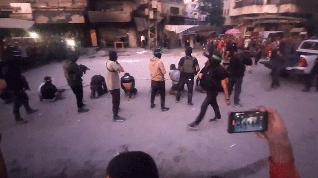 Graphic videos circulating on social media show masked Hamas gunmen executing eight blindfolded men in Gaza City’s Al Sabra neighbourhood before a crowd of onlookers. 