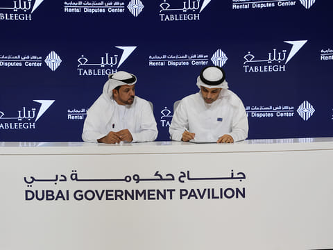 Mohammed Hamad Al Mahri from the RDC (right) and Humaid Obaid Humaid Al Mansoor are seen during the signing of partnership agreement