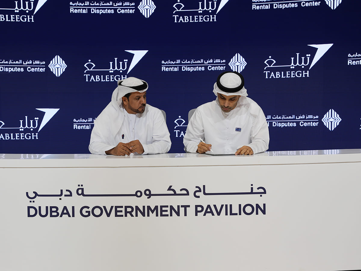 Mohammed Hamad Al Mahri from the RDC (right) and Humaid Obaid Humaid Al Mansoor are seen during the signing of partnership agreement