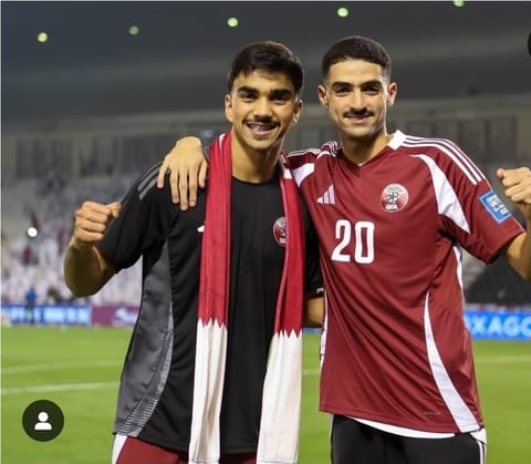 Tahsin celebrating with another Qatari player 