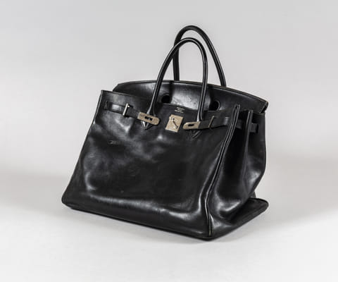 The Birkin Voyageur, a rare black Hermès Birkin, once owned, carried, and personally inscribed by the late Jane Birkin herself