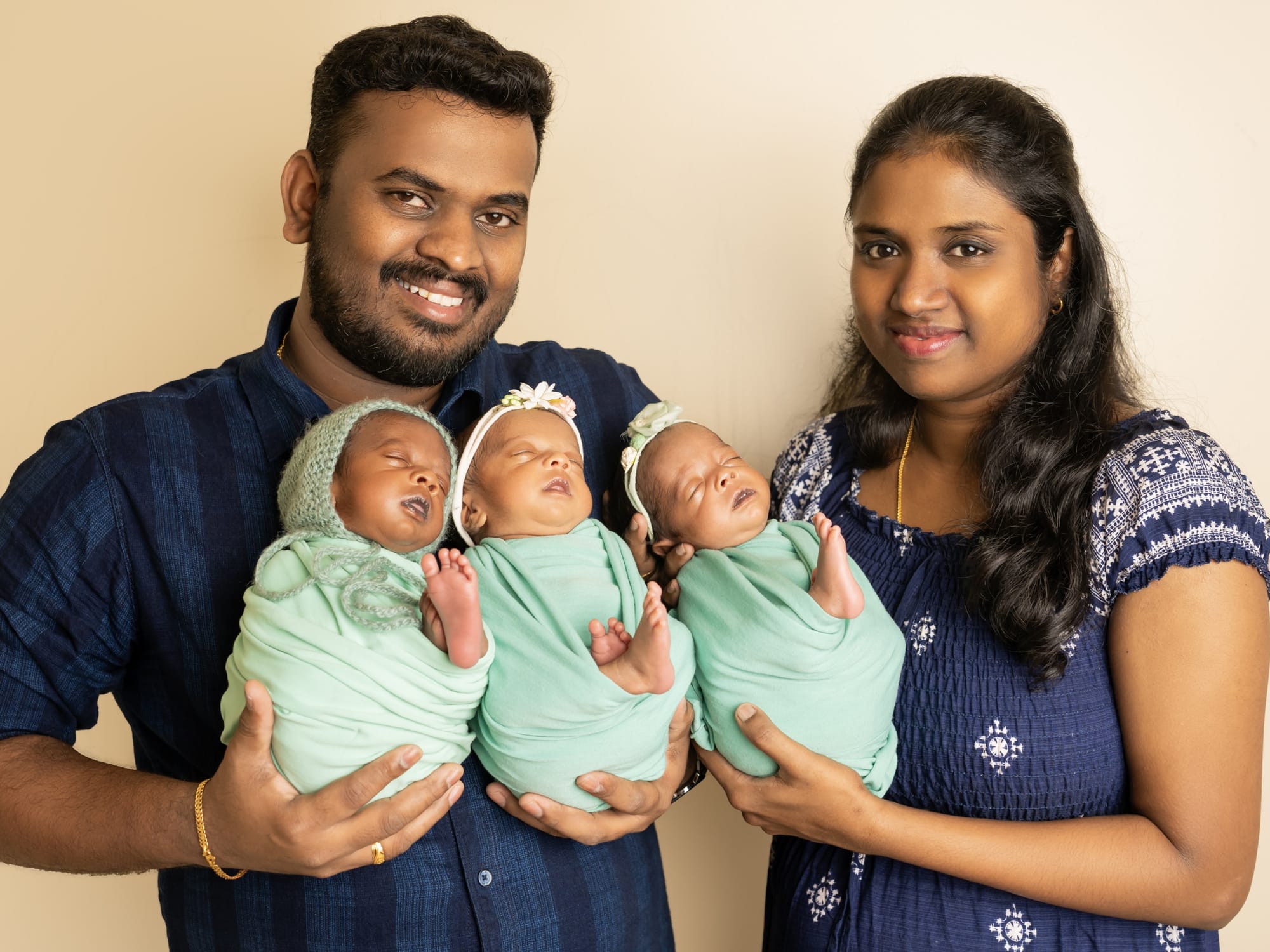 Karthikeyan Thangavel and Vinitha Nagaraj with their triplets born at Medeor Hospital, Dubai.