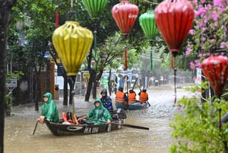 Vietnam’s ancient town turns into a river after record floods