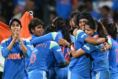 India's players celebrate their win at the end of the ICC Women's Cricket World Cup 2025 one-day international (ODI) final match between India and South Africa at the DY Patil Stadium in Navi Mumbai on November 3, 2025.