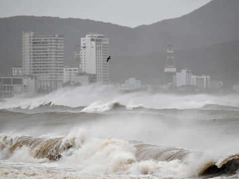 Waves crash onto Quy Nhon beach ahead of the arrival of Typhoon Kalmaegi in Gia Lai province in central Vietnam.