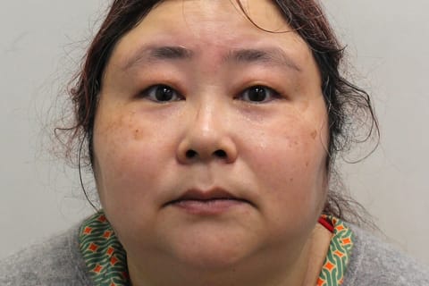 An undated handout picture released by the Metropolitan Police Service (MPS) on September 29, 2025 in London, shows Chinese national Zhimin Qian, alias Yadi Zhang, who was convicted for over her role in a multi billion-dollar Bitcoin fraud, posing for a photograph.