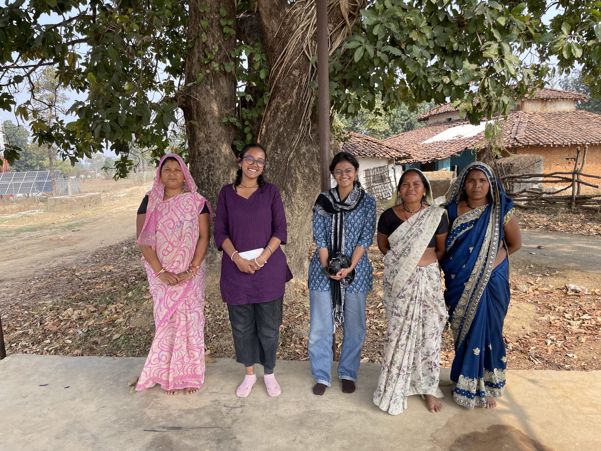 Niranjana Sunil and Arya Kulkarni with the tribal people