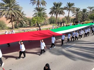A 1.2km flag of determination: UAE marks Eid Al Etihad with 54 million steps in Al Ain