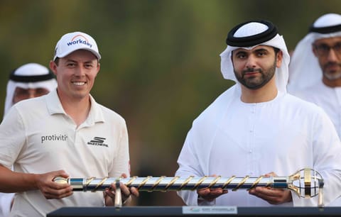 Sheikh Mansoor Bin Mohammed Bin Rashid Al Maktoum hands over the trophy to Matt Fitzpatrick on Sunday.