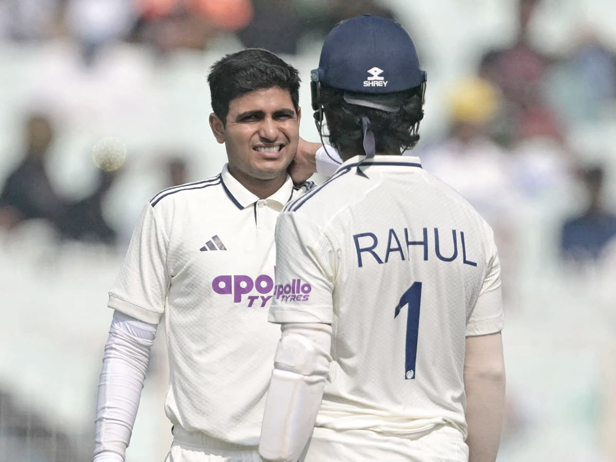 India's captain Shubman Gill (L) reacts after being injured during the second day of the first Test match against South Africa at the Eden Gardens in Kolkata on November 15, 2025. 