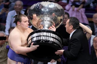 Ukrainian sumo wrestler shocked to win first title