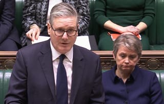 In this video grab taken from footage broadcast by the UK Parliamentary Recording Unit (PRU) via the Parliament TV website on November 25, 2025, Britain's Prime Minister Keir Starmer, flanked by Britain's Foreign Secretary Yvette Cooper, makes a statement to MPs on the G20 and Ukraine, in the House of Commons.
