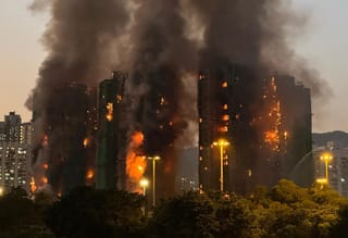 65 dead, many 'still trapped' in Hong Kong residential tower fire