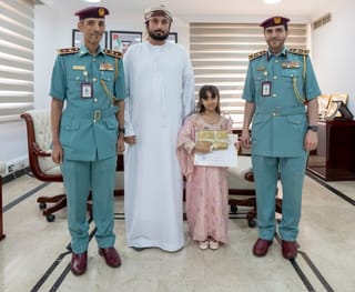 Ajman Police honours young girl for returning lost money