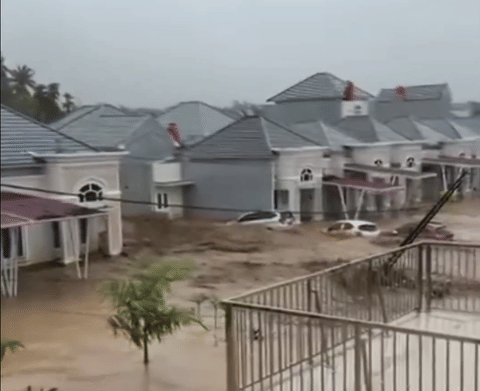 A screengrab taken from a video showing flooding in Lumin Park Housing Complex in Lubuk Minturun, Padang, West Sumatra, Indonesia on Thursday (Nov. 27, 2025).