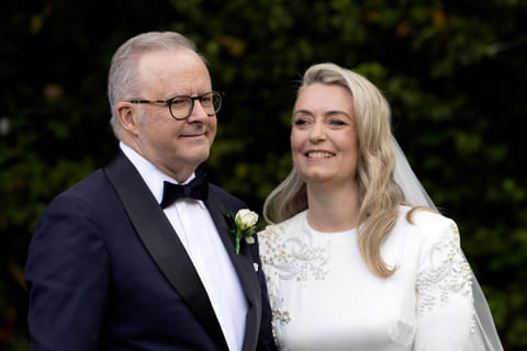 Australia's Prime Minister Anthony Albanese and his new wife Jodie Haydon stand together during their wedding ceremony in Canberra on November 29, 2025.  