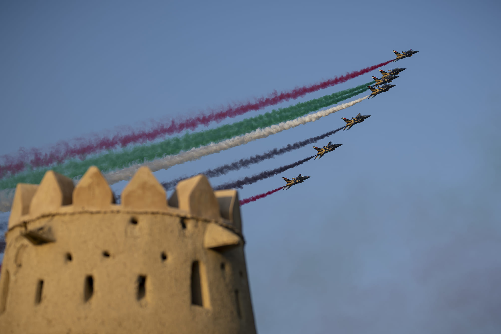 Pictured above is a spectacular air display at the celebration for 181 grooms from the Al Ain region at Al Jahili Fort. 