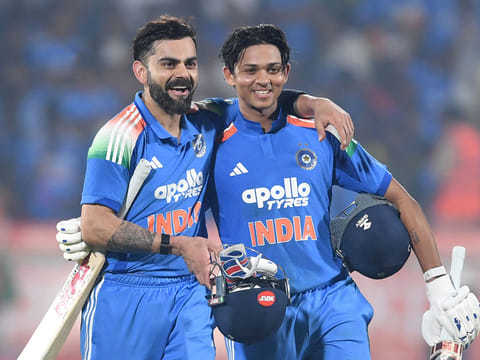 India's Virat Kohli (L) and Yashasvi Jaiswal celebrate after winning the third ODI against South Africa at the Y.S. Rajasekhara Reddy Cricket Stadium in Visakhapatnam on December 6, 2025. 