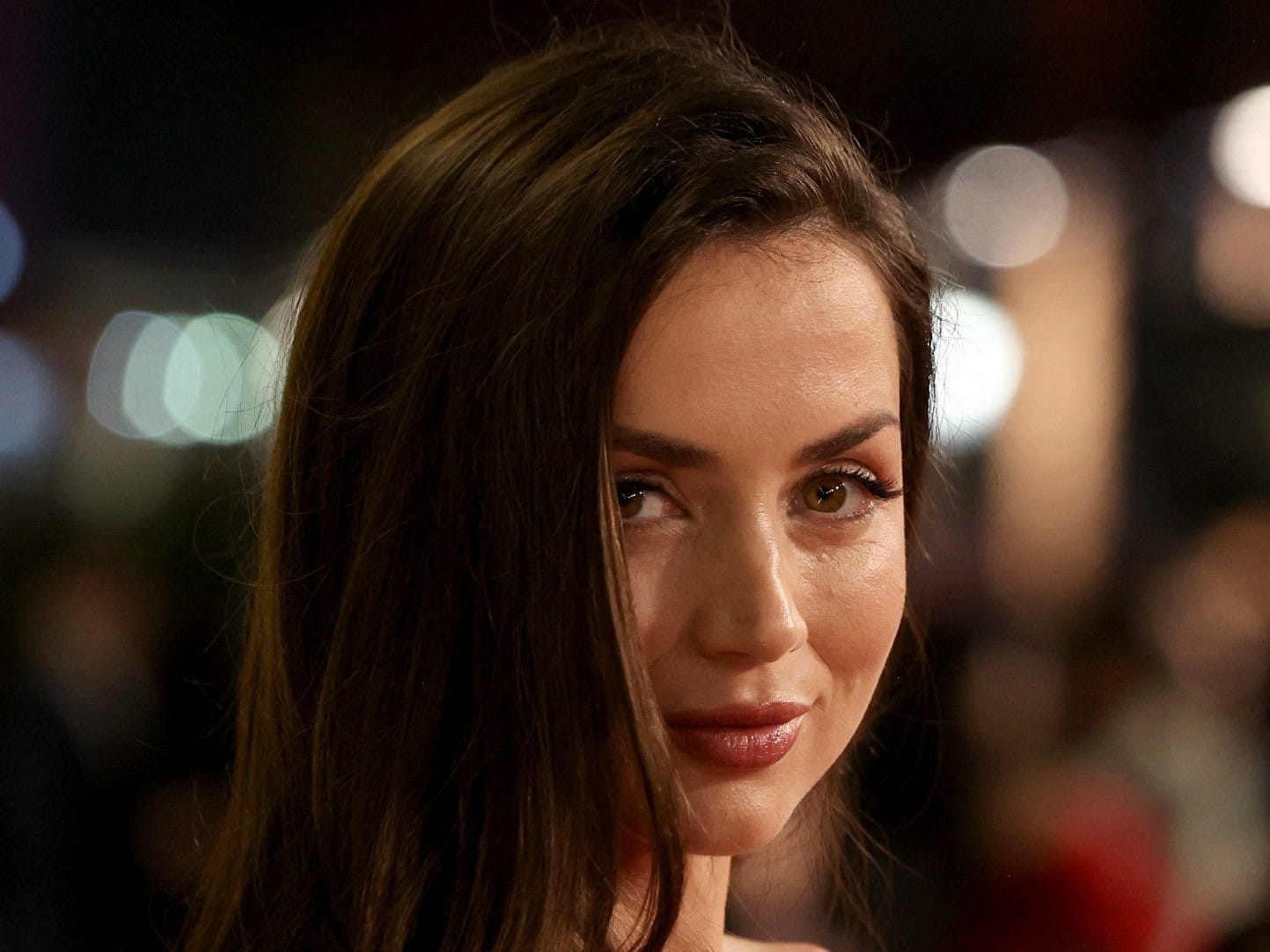 Ana De Armas poses on the red carpet during the opening ceremony of the 5th edition of the Red Sea Film Festival in Jeddah, Saudi Arabia, on December 4, 2025.
