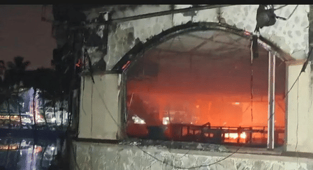 The victims include 20 staff members and five tourists, many of whom suffocated to death in a basement kitchen after being trapped by a single narrow exit route.