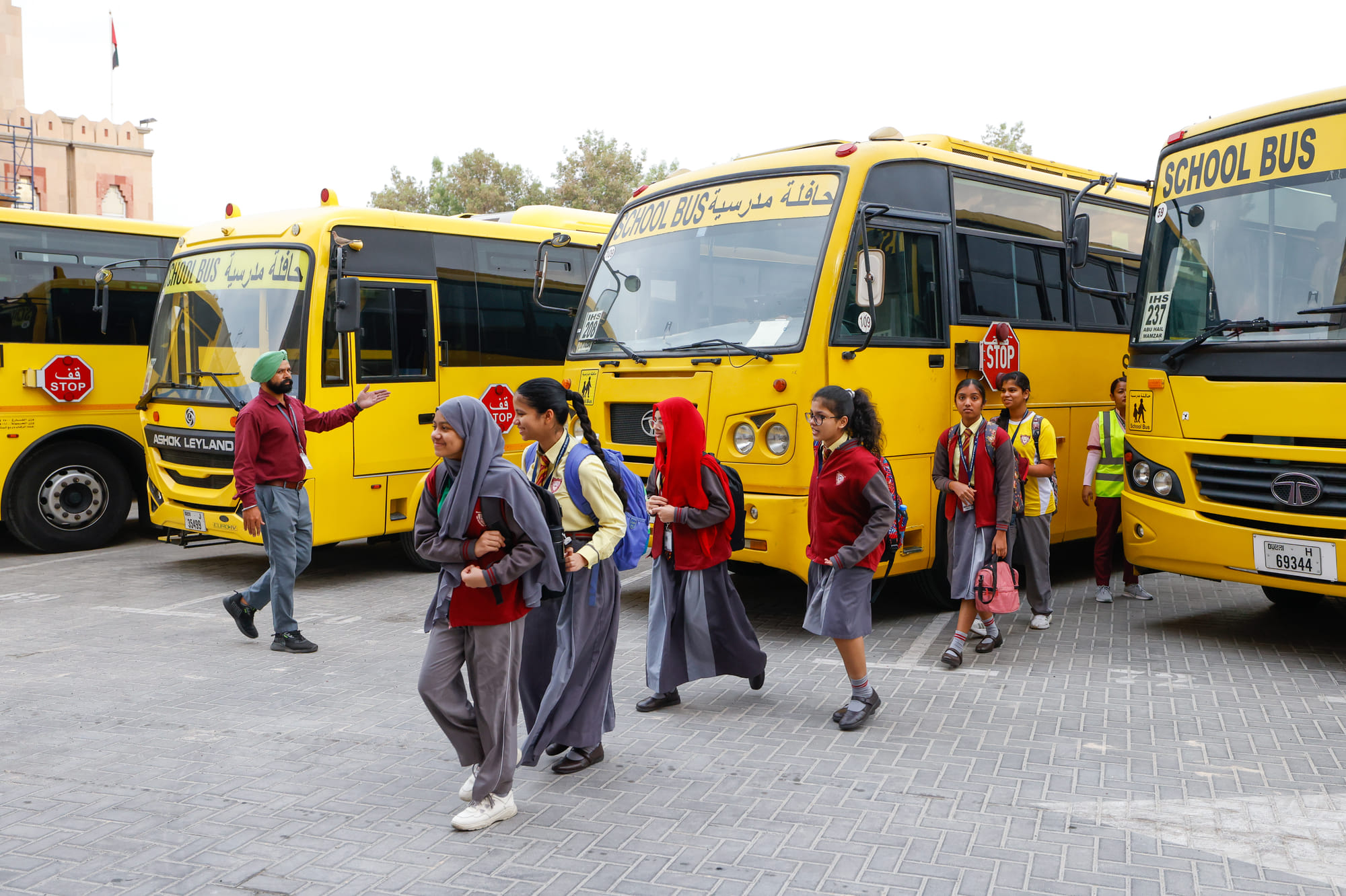 Students at Indian High School in Oud Metha, Dubai   SCHOOL BUS