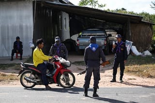 Volunteers patrol Thai villages as artillery rains at Cambodia border
