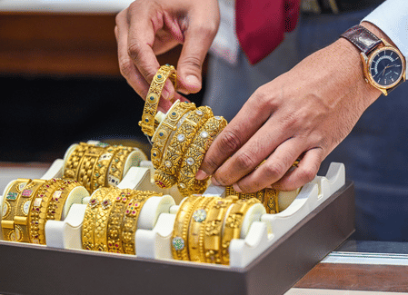 Gold, silver hit record highs amid US‑Europe tensions.