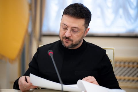 This handout photograph taken on December 23, 2025 and released by the Ukrainian Presidential Office on December 24, 2025 shows Ukraine's President Volodymyr Zelensky during a meeting with journalists in Kyiv.